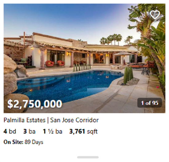 Charming Palmilla casita with terracotta roof, arched entryway, and desert landscaping