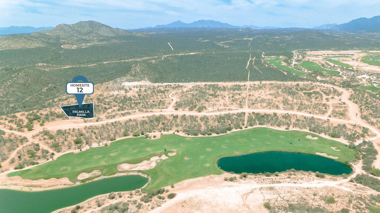 A Golf Course With Water In The Middle
