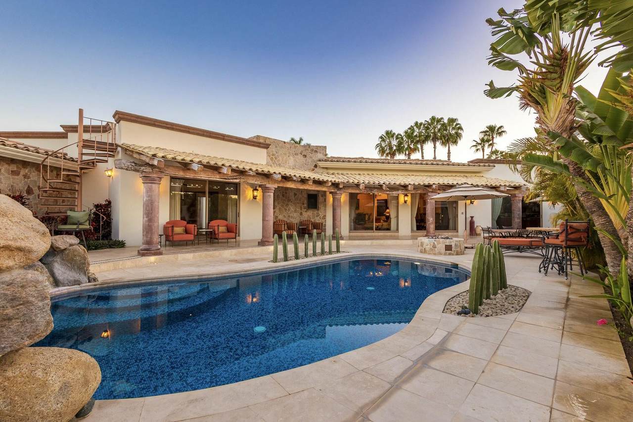 A Swimming Pool And A House